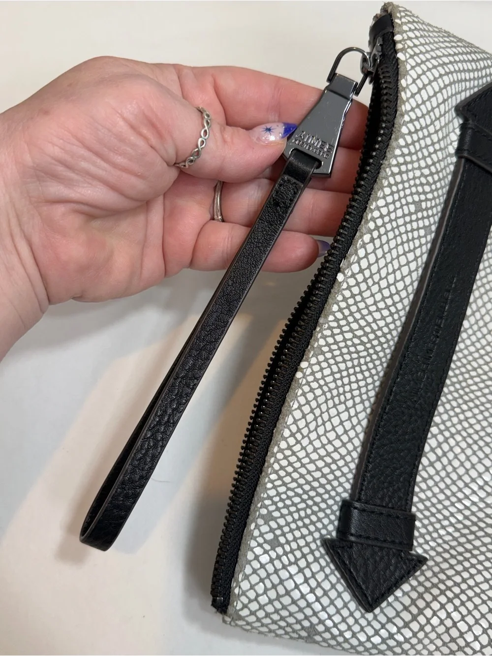 Aimee Kestenberg gray cream black leather zip top clutch